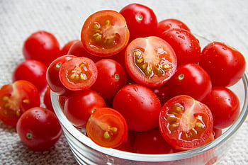 red tomatoes, glass bowl, cherry tomatoes, vibrant red, freshness, healthy food, fresh produce, vegetable, salad ingredient, organic, close-up