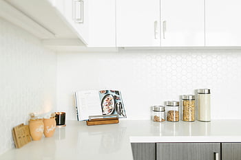 glass jars, kitchen countertop, minimalist kitchen, storage jars, bright kitchen, white countertop, kitchen decor, modern kitchen