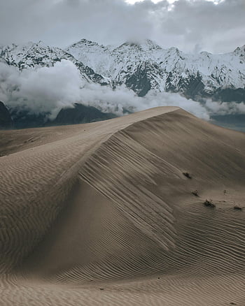 Sand Dune, Desert, Skardu, snowy mountains, vertical view, serene beauty, nature photography, landscape photography, natural scenery, outdoor adventure, travel photography