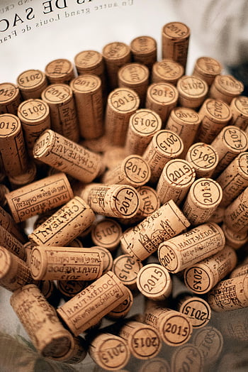 wine bottle corks, 2015 corks, wine collection, vertical shot, assorted corks, table display, Haut-Médoc, Château Meyre, wine labels, cork collection, wine enthusiasts