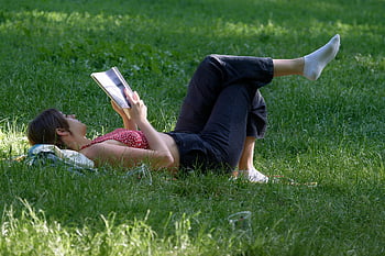 girlie, casual, relaxing, lying, grass, parka, naturally, nature, reading, book, lifestyle