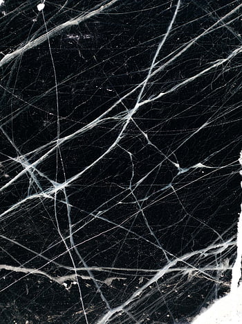 close-up ice, black ice, white cracks, nature's artistry, intricate ice, frozen texture, ice patterns, ice details, ice close-up, ice cracks, ice surface