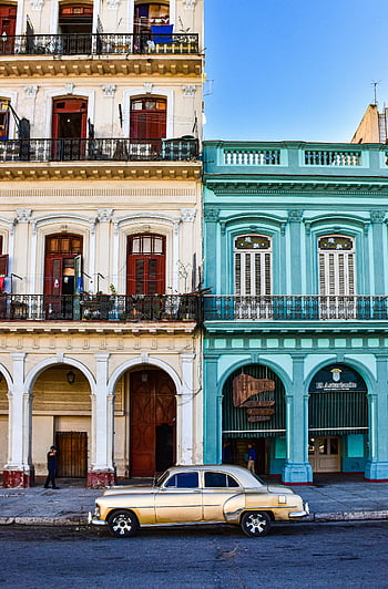 vintage car, parked on street, Havana, classic cars, colonial buildings, charming street view, Cuba, street scene, old Havana, historic architecture, vintage automobile