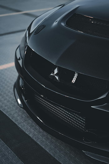 Black Mitsubishi Lancer Evolution, custom tuning, vertical shot, car front, close-up, black car, Mitsubishi logo, performance car, automotive, car details, street parking