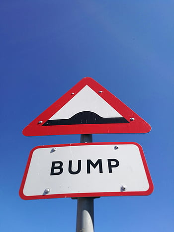 road bump warning sign, sunny day, clear blue sky, close-up, bump sign, traffic sign, road sign, warning sign, road bump, road safety, outdoor sign