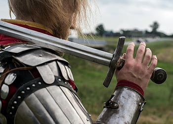 knight, sword, armor, medieval, close-up, historic warfare, outdoors, medieval knight, holding sword, metal armor, battlefield