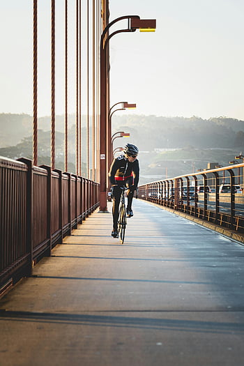 Golden Gate Bridge, cyclist, sunny day, San Francisco, bicycle, bridge, outdoor, riding, iconic, man, cycling