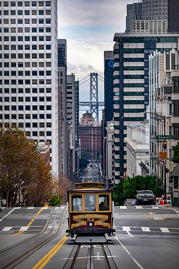 San Francisco, cable car, California Street, Powell Street, city skyline, Bay Bridge, urban view, street scene, historic transportation, downtown San Francisco, cityscape