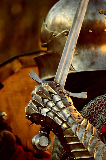 Knight Armor, medieval knight, steel gauntlet, sword, historical armor, detailed view, medieval armor, knight's gauntlet, medieval sword, armor details, medieval history