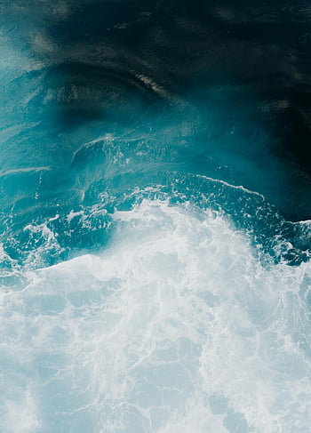 ocean waves, blue ocean, turquoise waves, crashing waves, ocean foam, aerial view, ocean photography, wave photography, natural beauty, water texture, ocean surface
