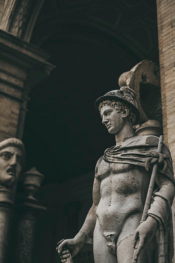 Hermes statue, classical mythology, Italian structure, close-up, Hermes-Mercurio, ancient sculpture, marble statue, Roman god, Greek god, architectural detail, mythological figure