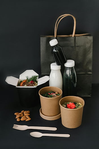 eco-friendly food containers, disposable containers, sustainable takeaway, food delivery, black surface, takeaway options, eco-friendly bottles, takeaway containers, food and drinks delivery, sustainable packaging, black background