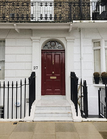 Georgian-style doorway, red door, London UK, classic doorway, white building, black railing, house entrance, residential door, urban architecture, front door, steps