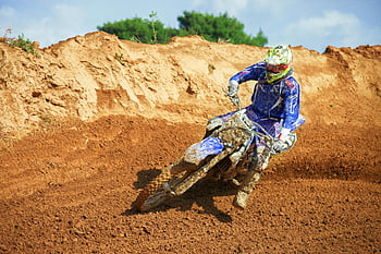 man riding enduro, motocross, sand dune, sharp turn, dirt track, Greece, dynamic scene, rider, outdoor sports, off-road, motorcycle racing