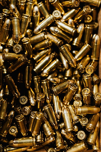 bullets, brass ammunition, close-up, scattered bullets, pile of bullets, detailed photo, ammunition bullets, brass bullets, gun bullets, bullet pile, bullet close-up