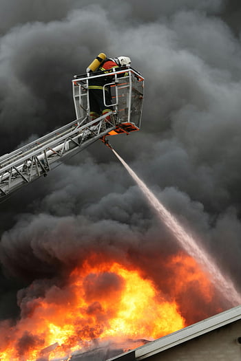 firefighter, watering, burning roof, firefighters, ladder truck, fierce blaze, thick smoke, fire, emergency response, rescue operation, firefighting