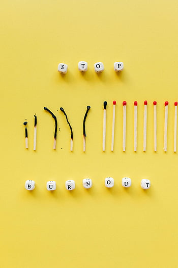 burnout, stop burnout, burned matches, mental health, stress management, work life balance, conceptual art, yellow background, emotional health, self care, visual metaphor