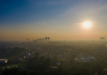 aerial photography, city skyline, sunrise, morning fog, Sindang Jaya, Banten, vibrant skyline, aerial view, cityscape, urban landscape, sunrise city view