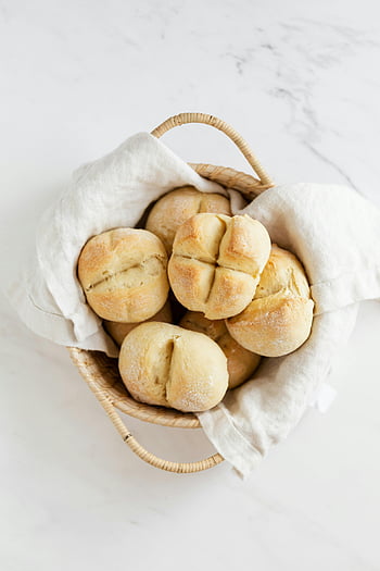 Swiss buns, fresh bread rolls, wicker basket, marble table, homemade bread, delicious rolls, meal accompaniment, bread basket, marble surface, soft buns, baked goods