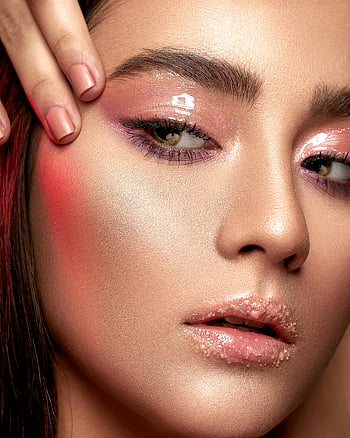 woman's face, close-up photo, glossy makeup, elegant eyebrows, detailed close-up, makeup details, facial features, beauty portrait, skin texture, eye makeup, lip gloss