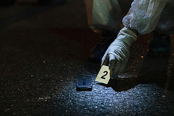 forensic investigator, marking evidence, city street, night scene, examining evidence, crime scene, evidence marker, gloves, protective suit, urban crime, night investigation