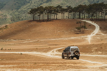 Mitsubishi Pajero, dirt road, off-road adventure, SUV, scenic hills, driving, outdoor, landscape, adventure, vehicle, nature