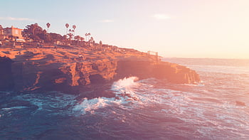La Jolla-klippene, San Diego, solnedgang, havbølger, brun klippe, blå himmel, kystutsikt, Strandlandskap, naturlandskap, steinete kystlinje, palmer