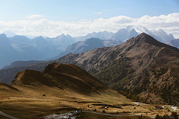 Dolomite Alps, birds eye view, dramatic peaks, vast wilderness, mountain landscape, breathtaking view, Dolomites mountains, alpine scenery, natural beauty, high altitude, scenic vista