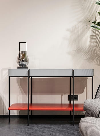 modern console table, sleek interior, contemporary decor, small table, wall decoration, stylish table, red shelf, black legs, modern decor, interior design, living room furniture