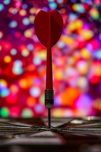 dart, red dart, bullseye, precision, focus, bokeh background, colorful bokeh, vibrant bokeh, symbolic photography