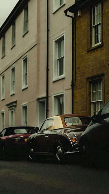 klasické auto, Nissan Figaro, zaparkovaná ulice, klidná ulice, Barevné fasády budovy, Historické auto, retro auto, městské scény, fotografování automobilů, pouliční fotografie, klasické vozidlo