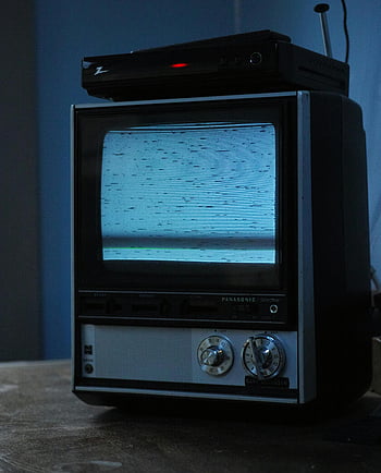 CRT TV, Panasonic, static, outdated technology, nostalgia, HD digital decoder, snowy image, classic television, vintage TV, retro electronics, old TV