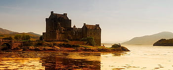Eilean Donan Castle, Scottish Highlands, sunset reflection, loch, bricked building, body of water, stunning view, castle reflection, historic castle, natural landscape, scenic beauty