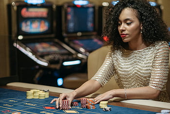african-american-woman-casino-gaming-betting-chips-elegant-woman-casino-table-gambling-poker-chips-casino-atmosphere-gaming-chips-casino-scene-thumbnail.jpg