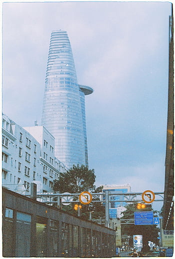 Bitexco Financial Tower, Ho Chi Minh City, Vietnam, iconic skyscraper, low angle view, cityscape, urban architecture, modern building, downtown Ho Chi Minh, tall building, Vietnam skyline